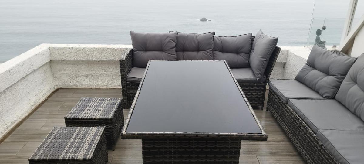 Moderno departamento con dormitorio y terraza con vista al mar y parrilla en Reñaca